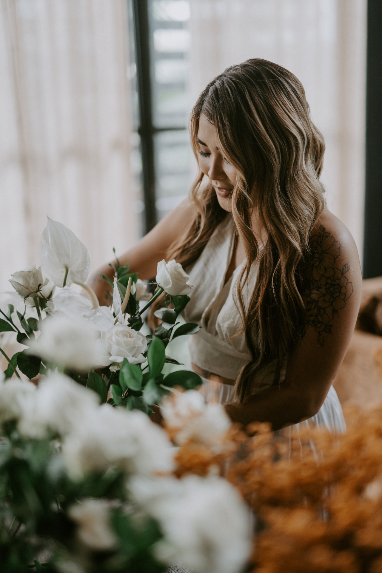 Reception table styling with florals and candlelight
